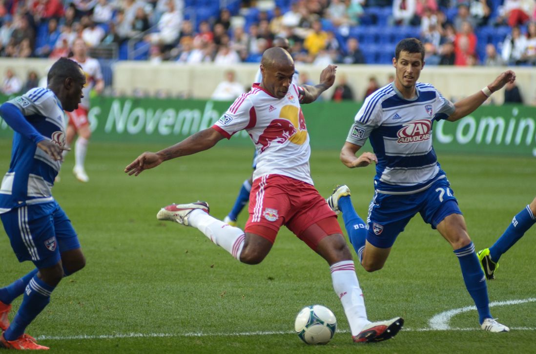 Thierry Henry sends a shot goalward in second half action.